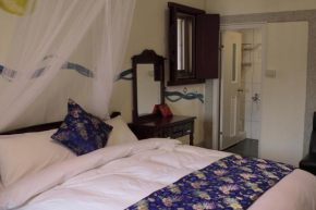 Отель Shuang Li House  Jinning